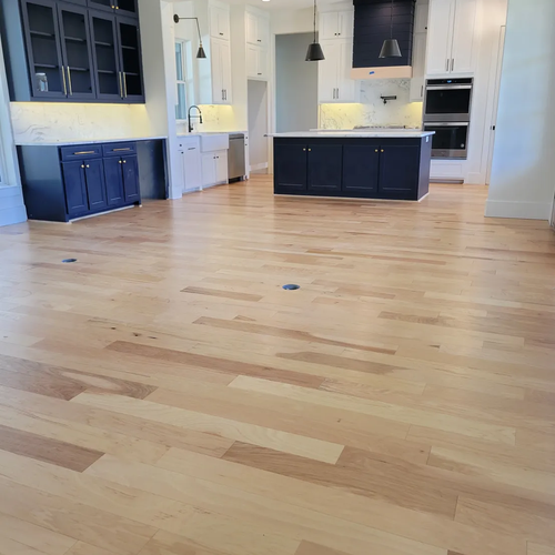 Happy Texas Hometown Floors customers in Forney, TX and the DFW area showing off their beautiful new flooring installations