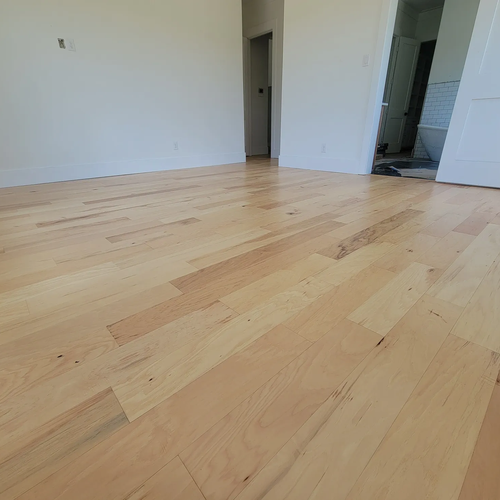 Happy Texas Hometown Floors customers in Forney, TX and the DFW area showing off their beautiful new flooring installations