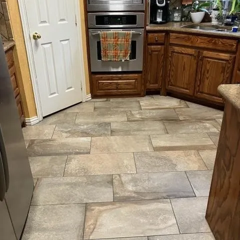 Happy Texas Hometown Floors customers in Forney, TX and the DFW area showing off their beautiful new flooring installations