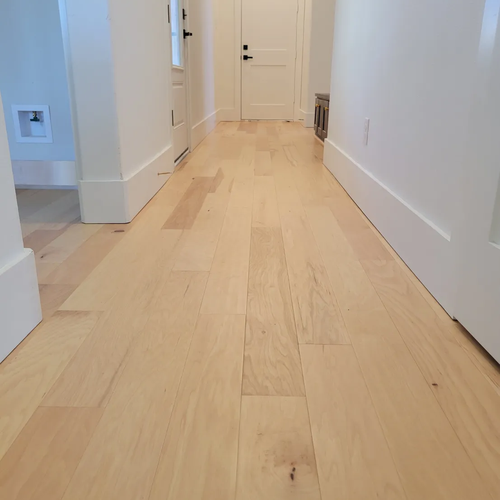 Happy Texas Hometown Floors customers in Forney, TX and the DFW area showing off their beautiful new flooring installations
